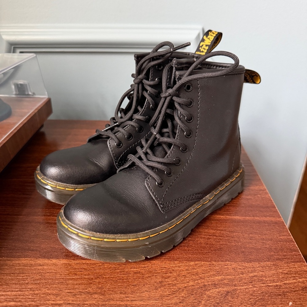 Kids Dr Martens black lace up combat boots
